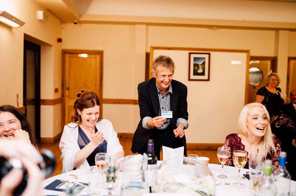 Luke performing magic at a wedding near Bridgend